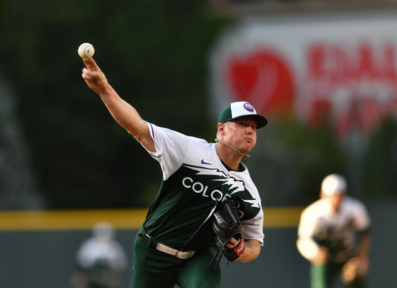 Jun 24, 2023; Denver, Colorado, USA; Colorado Rockies starting pitcher Chase Anderson (45) delivers a pitch in the first inning against the Los Angeles Angels at Coors Field. Mandatory Credit: John Leyba-USA TODAY Sports