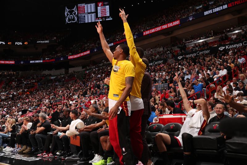 MIAMI, FL - MARCH 22: The Miami Heat bench celebrates a three point basket by Thomas Bryant #31 during the game against the New Orleans Pelicans on March 22, 2024 at Kaseya Center in Miami, Florida. NOTE TO USER: User expressly acknowledges and agrees that, by downloading and or using this Photograph, user is consenting to the terms and conditions of the Getty Images License Agreement. Mandatory Copyright Notice: Copyright 2024 NBAE (Photo by Issac Baldizon/NBAE via Getty Images)