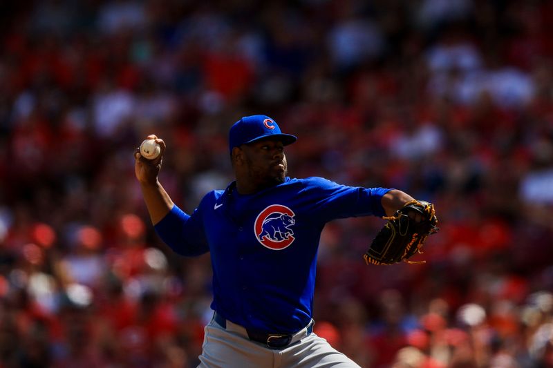 Jun 9, 2024; Cincinnati, Ohio, USA; Chicago Cubs relief pitcher Hector Neris (51) pitches against the Cincinnati Reds in the ninth inning at Great American Ball Park. Mandatory Credit: Katie Stratman-USA TODAY Sports