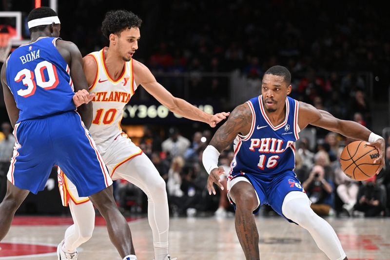 ATLANTA, GEORGIA - MARCH 10: Lonnie Walker IV #16 of the Philadelphia 76ers handles the ball during the game against the Atlanta Hawks during the first quarter at State Farm Arena on March 10, 2025 in Atlanta, Georgia. NOTE TO USER: User expressly acknowledges and agrees that, by downloading and or using this photograph, User is consenting to the terms and conditions of the Getty Images License Agreement.  (Photo by Paras Griffin/Getty Images)