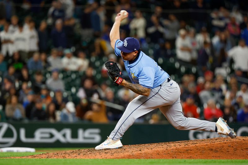 Aug 27, 2024; Seattle, Washington, USA; Tampa Bay Rays relief pitcher Manuel Rodriguez (39) throws against the Seattle Mariners during the ninth inning at T-Mobile Park. Mandatory Credit: Joe Nicholson-USA TODAY Sports