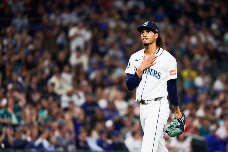 Sep 23, 2025; Seattle, Washington, USA; Seattle Mariners pitcher Carlos Vargas (54) reacts following the final out against the Colorado Rockies of the top of the seventh inning at T-Mobile Park. Mandatory Credit: Joe Nicholson-Imagn Images