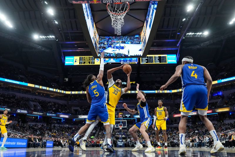 INDIANAPOLIS, IN - JANUARY 10: Myles Turner #33 of the Indiana Pacers drives to the basket during the game against the Golden State Warriors on January 10, 2025 at Gainbridge Fieldhouse in Indianapolis, Indiana. NOTE TO USER: User expressly acknowledges and agrees that, by downloading and or using this Photograph, user is consenting to the terms and conditions of the Getty Images License Agreement. Mandatory Copyright Notice: Copyright 2025 NBAE (Photo by A.J. Mast/NBAE via Getty Images)