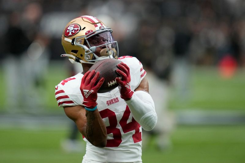 San Francisco 49ers wide receiver Dazz Newsome (84) warms up before an NFL football game against the Las Vegas Raiders, Sunday, Aug. 13, 2023, in Las Vegas. (AP Photo/John Locher)