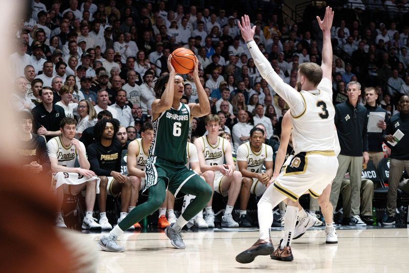 Feb 26, 2026; West Lafayette, Indiana, USA; Michigan State Spartans forward Jordan Scott (6) looks to shoot the ball as Purdue Boilermakers guard Braden Smith (3) defends during the first half at Mackey Arena. Mandatory Credit: Jacob Musselman-Imagn Images
