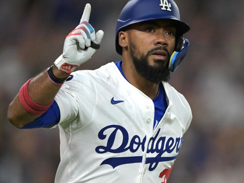 May 21, 2025; Los Angeles, California, USA;  Los Angeles Dodgers right fielder Teoscar Hernandez (37) reacts as he rounds the bases after hitting a three-run home run in the sixth inning against the Arizona Diamondbacks at Dodger Stadium. Mandatory Credit: Jayne Kamin-Oncea-Imagn Images