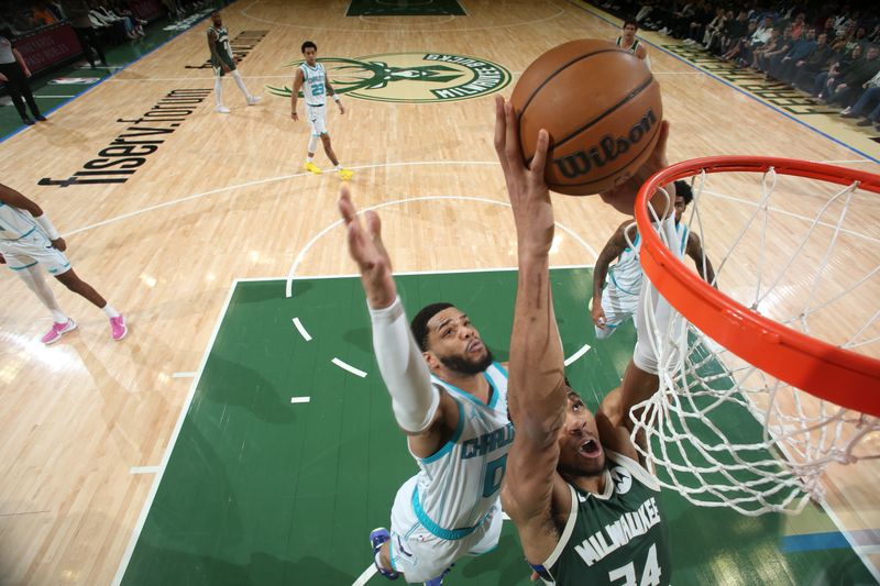 MILWAUKEE, WI - FEBRUARY 27: Giannis Antetokounmpo #34 of the Milwaukee Bucks drives to the basket during the game against the Charlotte Hornets on February 27, 2024 at the Fiserv Forum Center in Milwaukee, Wisconsin. NOTE TO USER: User expressly acknowledges and agrees that, by downloading and or using this Photograph, user is consenting to the terms and conditions of the Getty Images License Agreement. Mandatory Copyright Notice: Copyright 2024 NBAE (Photo by Gary Dineen/NBAE via Getty Images).