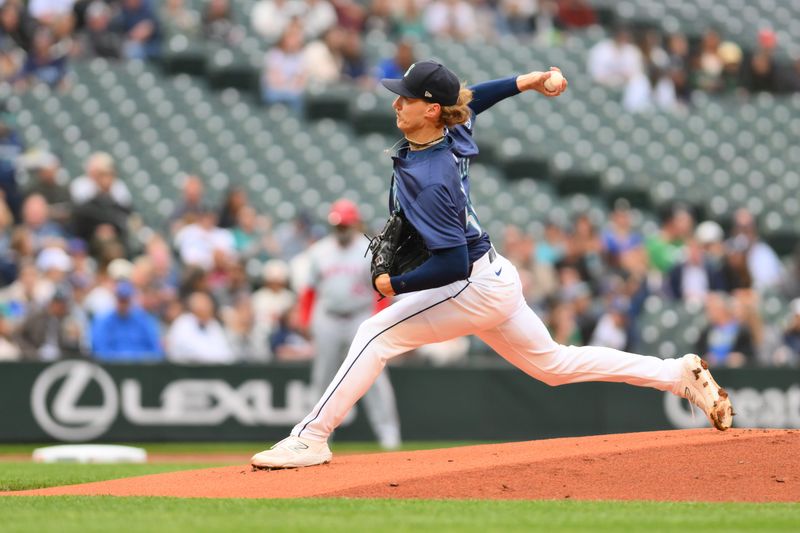 Jul 22, 2024; Seattle, Washington, USA; Seattle Mariners starting pitcher Bryce Miller (50) pitches to the Los Angeles Angels during the first inning at T-Mobile Park. Mandatory Credit: Steven Bisig-USA TODAY Sports