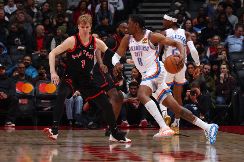 TORONTO, CANADA - MARCH 22:  Gradey Dick #1 of the Toronto Raptors plays defense during the game  against Jalen Williams #8 of the Oklahoma City Thunder on March 22, 2024 at the Scotiabank Arena in Toronto, Ontario, Canada.  NOTE TO USER: User expressly acknowledges and agrees that, by downloading and or using this Photograph, user is consenting to the terms and conditions of the Getty Images License Agreement.  Mandatory Copyright Notice: Copyright 2024 NBAE (Photo by Vaughn Ridley/NBAE via Getty Images)