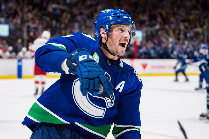 Oct 24, 2022; Vancouver, British Columbia, CAN; Vancouver Canucks forward J.T. Miller (9) celebrates his second goal of the game against Carolina Hurricanes in the third period at Rogers Arena. Carolina won 3-2. Mandatory Credit: Bob Frid-USA TODAY Sports