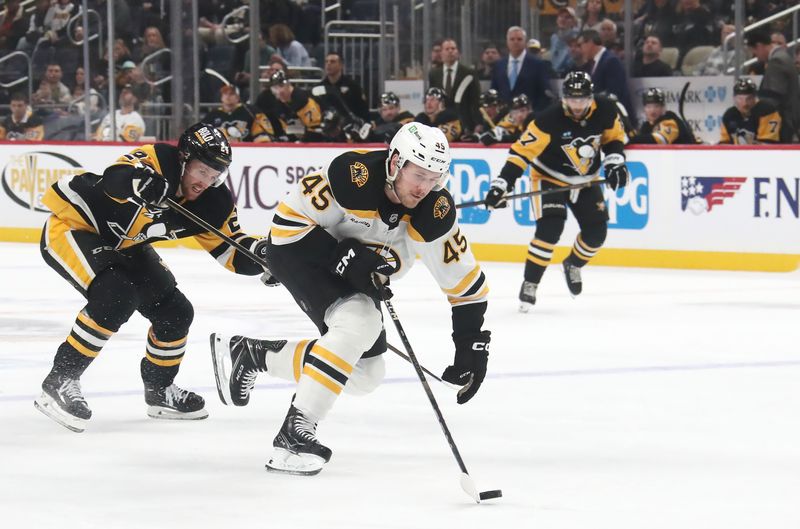 Mar 1, 2025; Pittsburgh, Pennsylvania, USA;  Boston Bruins left wing Cole Koepke (45) skates up ice with the puck as Pittsburgh Penguins defenseman Matt Grzelcyk (24) chases during the second period at PPG Paints Arena. Mandatory Credit: Charles LeClaire-Imagn Images