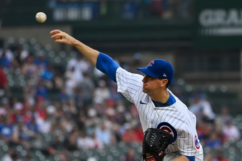 Jun 29, 2023; Chicago, Illinois, USA;  Chicago Cubs starting pitcher Kyle Hendricks (28) delivers against the Philadelphia Phillies during the first inning at Wrigley Field. Mandatory Credit: Matt Marton-USA TODAY Sports