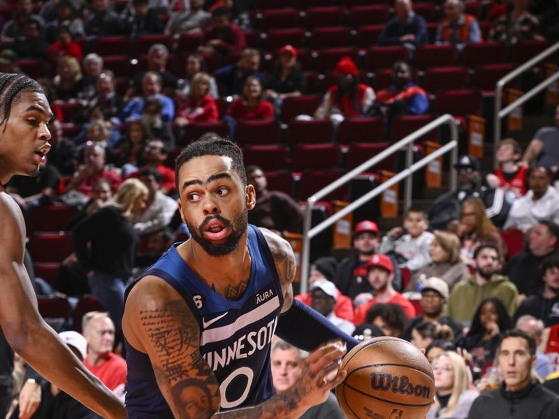 HOUSTON, TX - JANUARY 23:   D'Angelo Russell #0 of the Minnesota Timberwolves drives to the basket during the game against the  Houston Rockets on January 23, 2023 at the Toyota Center in Houston, Texas. NOTE TO USER: User expressly acknowledges and agrees that, by downloading and or using this photograph, User is consenting to the terms and conditions of the Getty Images License Agreement. Mandatory Copyright Notice: Copyright 2023 NBAE (Photo by Logan Riely/NBAE via Getty Images)