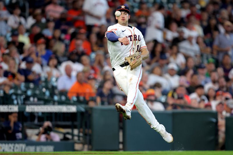 Aug 18, 2024; Houston, Texas, USA; Houston Astros third baseman Shay Whitcomb (10) throws a fielded ball to first base against the Chicago White Sox during the fifth inning at Minute Maid Park. Mandatory Credit: Erik Williams-USA TODAY Sports