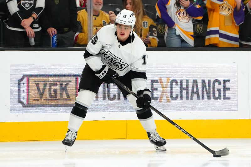 Oct 22, 2024; Las Vegas, Nevada, USA; Los Angeles Kings center Alex Turcotte (15) warms up before a game against the Vegas Golden Knights at T-Mobile Arena. Mandatory Credit: Stephen R. Sylvanie-Imagn Images