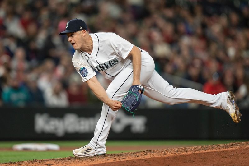 Apr 22, 2023; Seattle, Washington, USA; Seattle Mariners reliever Paul Sewald (37) delivers a pitch during the ninth inning against the St. Louis Cardinals at T-Mobile Park. Mandatory Credit: Stephen Brashear-USA TODAY Sports