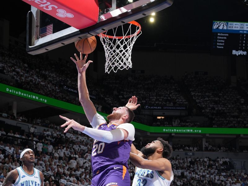 MINNEAPOLIS, MN -  APRIL 20: Jusuf Nurkic #20 of the Phoenix Suns shoots the ball during Round One Game One of the 2024 NBA Playoffs against the Minnesota Timberwolves on April 20, 2024 at Target Center in Minneapolis, Minnesota. NOTE TO USER: User expressly acknowledges and agrees that, by downloading and or using this Photograph, user is consenting to the terms and conditions of the Getty Images License Agreement. Mandatory Copyright Notice: Copyright 2024 NBAE (Photo by Jordan Johnson/NBAE via Getty Images)