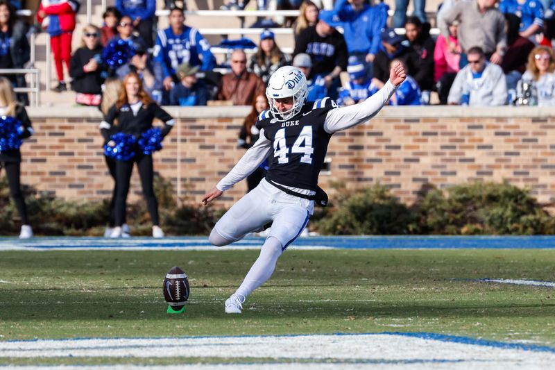 Nov 25, 2023; Durham, North Carolina, USA; Duke Blue Devils place kicker Charlie Ham (44) kicks the football during the second half of the game against Pittsburgh Panthers at Wallace Wade Stadium.  Mandatory Credit: Jaylynn Nash-USA TODAY Sports