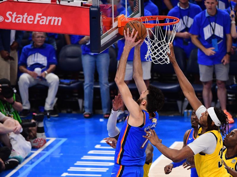 OKLAHOMA CITY, OK - JUNE 22: Chet Holmgren #7 of the Oklahoma City Thunder drives to the basket during the game against the Indiana Pacers during Game Seven of the 2025 NBA Finals on June 22, 2025 at Paycom Center in Oklahoma City, Oklahoma. NOTE TO USER: User expressly acknowledges and agrees that, by downloading and or using this photograph, User is consenting to the terms and conditions of the Getty Images License Agreement. Mandatory Copyright Notice: Copyright 2025 NBAE (Photo by Adam Pantozzi/NBAE via Getty Images)