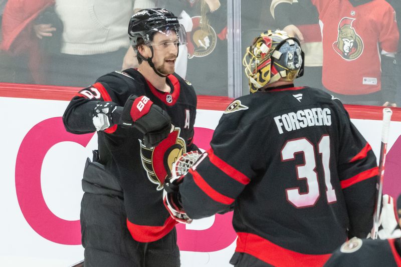 Jan 30, 2025; Ottawa, Ontario, CAN; Ottawa Senators defenseman Thomas Chabot (72) celebrates with goalie Anton Forsberg (31) their win in overtime against the Washington Capitals at the Canadian Tire Centre. Mandatory Credit: Marc DesRosiers-Imagn Images