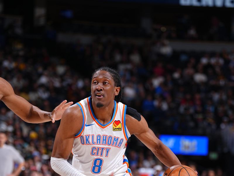 DENVER, CO - NOVEMBER 6: Jalen Williams #8 of the Oklahoma City Thunder dribbles the ball during the game against the Denver Nuggets on November 6, 2024 at Ball Arena in Denver, Colorado. NOTE TO USER: User expressly acknowledges and agrees that, by downloading and/or using this Photograph, user is consenting to the terms and conditions of the Getty Images License Agreement. Mandatory Copyright Notice: Copyright 2024 NBAE (Photo by Garrett Ellwood/NBAE via Getty Images)