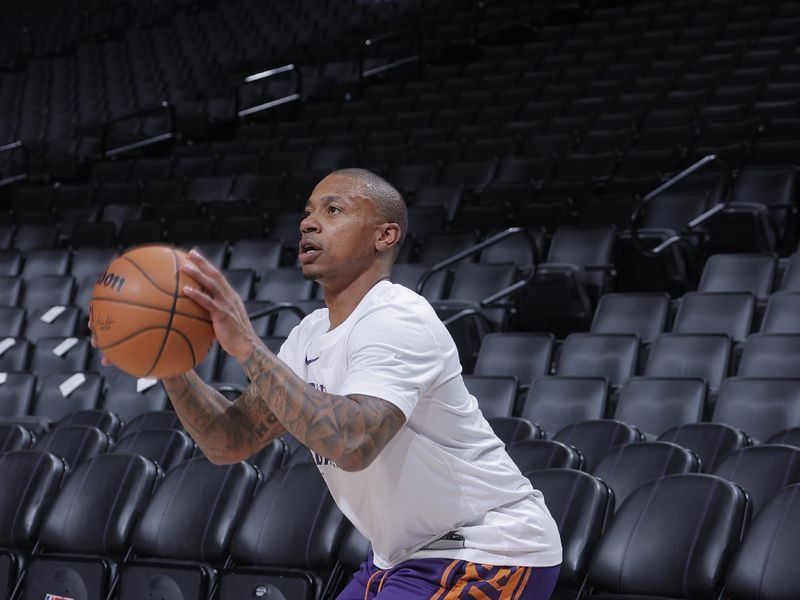 SACRAMENTO, CA - APRIL 12: Isaiah Thomas #4 of the Phoenix Suns warms up before the game against the Sacramento Kings on April 12, 2024 at Golden 1 Center in Sacramento, California. NOTE TO USER: User expressly acknowledges and agrees that, by downloading and or using this Photograph, user is consenting to the terms and conditions of the Getty Images License Agreement. Mandatory Copyright Notice: Copyright 2024 NBAE (Photo by Rocky Widner/NBAE via Getty Images)