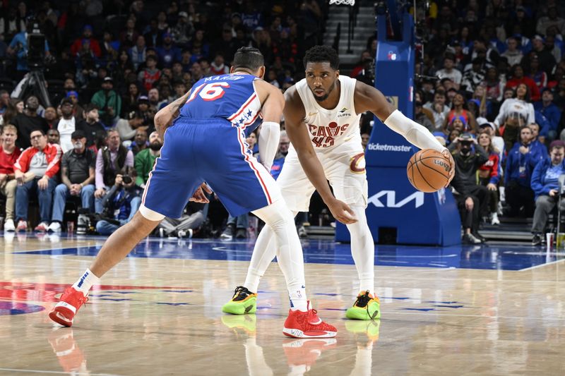 PHILADELPHIA, PA - NOVEMBER 13: Donovan Mitchell #45 of the Cleveland Cavaliers dribbles the ball during the game against the Philadelphia 76ers on November 13, 2024 at the Wells Fargo Center in Philadelphia, Pennsylvania NOTE TO USER: User expressly acknowledges and agrees that, by downloading and/or using this Photograph, user is consenting to the terms and conditions of the Getty Images License Agreement. Mandatory Copyright Notice: Copyright 2024 NBAE (Photo by David Dowt/NBAE via Getty Images)