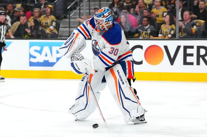 May 6, 2025; Las Vegas, Nevada, USA; Edmonton Oilers goaltender Calvin Pickard (30) settles a dump in by the Vegas Golden Knights during the second period of game one of the second round of the 2025 Stanley Cup Playoffs at T-Mobile Arena. Mandatory Credit: Stephen R. Sylvanie-Imagn Images
