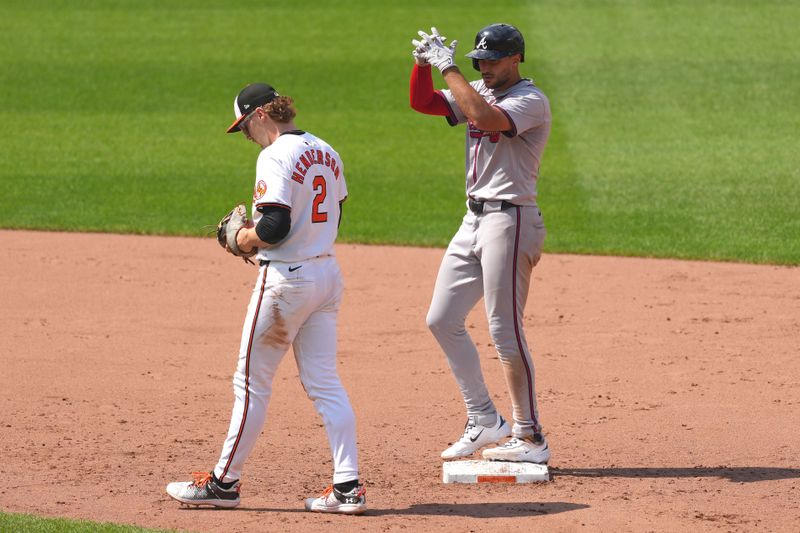 Jun 13, 2024; Baltimore, Maryland, USA; Atlanta Braves first baseman Matt Olson (28) reacts after driving in a run with his double in the ninth inning against the Baltimore Orioles at Oriole Park at Camden Yards. Mandatory Credit: Mitch Stringer-USA TODAY Sports