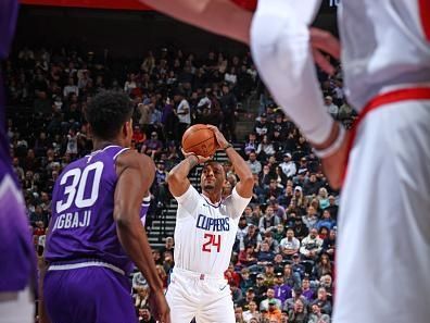 SALT LAKE CITY, UT - DECEMBER 8: Norman Powell #24 of the LA Clippers shoots the ball during the game against the Utah Jazz on December 8, 2023 at vivint.SmartHome Arena in Salt Lake City, Utah. NOTE TO USER: User expressly acknowledges and agrees that, by downloading and or using this Photograph, User is consenting to the terms and conditions of the Getty Images License Agreement. Mandatory Copyright Notice: Copyright 2023 NBAE (Photo by Melissa Majchrzak/NBAE via Getty Images)