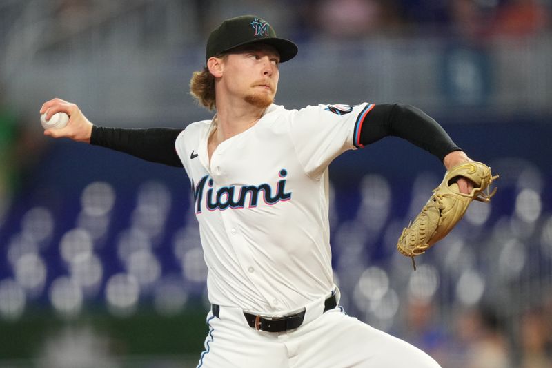 May 21, 2025; Miami, Florida, USA;  Miami Marlins pitcher Max Meyer (23) pitches in the first inning against the Chicago Cubs at loanDepot Park. Mandatory Credit: Jim Rassol-Imagn Images