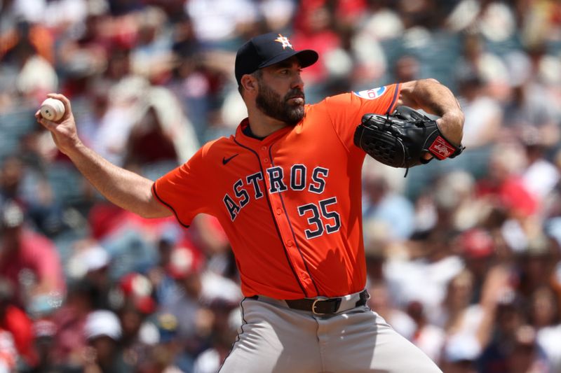 Jun 9, 2024; Anaheim, California, USA;  Houston Astros starting pitcher Justin Verlander (35) pitches during the third inning against the Los Angeles Angels at Angel Stadium. Mandatory Credit: Kiyoshi Mio-USA TODAY Sports