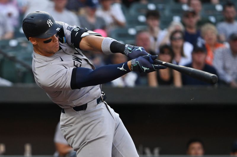 Apr 29, 2024; Baltimore, Maryland, USA;  New York Yankees outfielder Aaron Judge (99) singles during the first inning against the Baltimore Orioles at Oriole Park at Camden Yards. Mandatory Credit: Tommy Gilligan-USA TODAY Sports