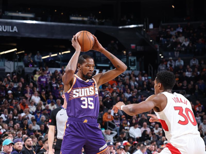 PHOENIX, AZ - MARCH 7: Kevin Durant #35 of the Phoenix Suns handles the ball during the game against the Toronto Raptors on March 7, 2024 at Footprint Center in Phoenix, Arizona. NOTE TO USER: User expressly acknowledges and agrees that, by downloading and or using this photograph, user is consenting to the terms and conditions of the Getty Images License Agreement. Mandatory Copyright Notice: Copyright 2024 NBAE (Photo by Jeff Haynes/NBAE via Getty Images)