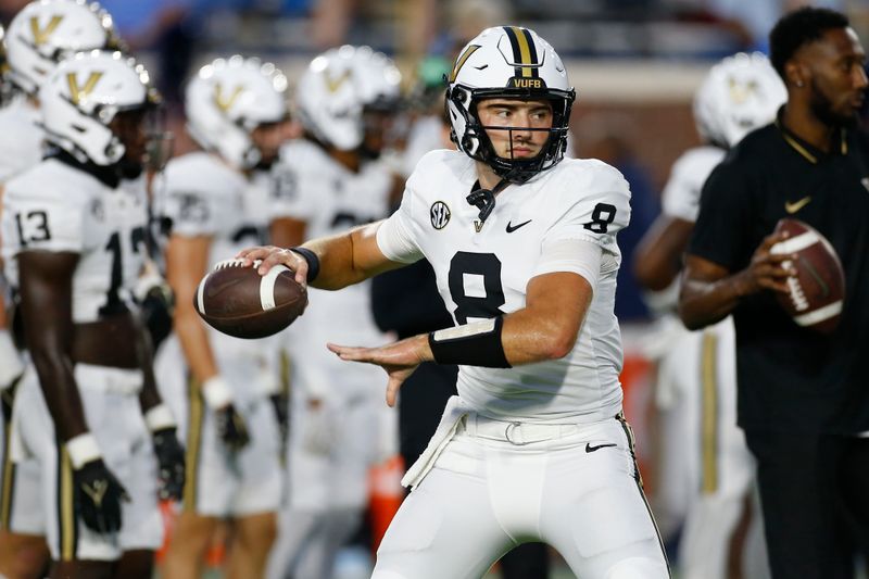 Oct 28, 2023; Oxford, Mississippi, USA; Vanderbilt Commodores quarterback Ken Seals (8) passes the ball during warm ups prior to a game against the Mississippi Rebels at Vaught-Hemingway Stadium. Mandatory Credit: Petre Thomas-USA TODAY Sports