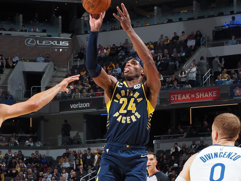 INDIANAPOLIS, IN - DECEMBER 14: Buddy Hield #24 of the Indiana Pacers shoots the ball during the game against the Golden State Warriors on December 14, 2022 at Gainbridge Fieldhouse in Indianapolis, Indiana. NOTE TO USER: User expressly acknowledges and agrees that, by downloading and or using this Photograph, user is consenting to the terms and conditions of the Getty Images License Agreement. Mandatory Copyright Notice: Copyright 2022 NBAE (Photo by Ron Hoskins/NBAE via Getty Images)