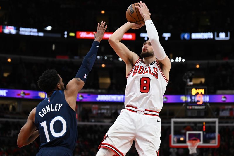 CHICAGO, ILLINOIS - MARCH 17: Zach LaVine #8 of the Chicago Bulls against Mike Conley #10 of the Minnesota Timberwolves at United Center on March 17, 2023 in Chicago, Illinois.  NOTE TO USER: User expressly acknowledges and agrees that, by downloading and or using this photograph, User is consenting to the terms and conditions of the Getty Images License Agreement.  (Photo by Quinn Harris/Getty Images)