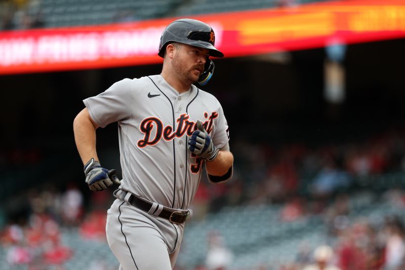 Sep 17, 2023; Anaheim, California, USA; Detroit Tigers catcher Jake Rogers (34) rounds the bases after hitting a home run during the second inning against the Los Angeles Angels at Angel Stadium. Mandatory Credit: Kiyoshi Mio-USA TODAY Sports