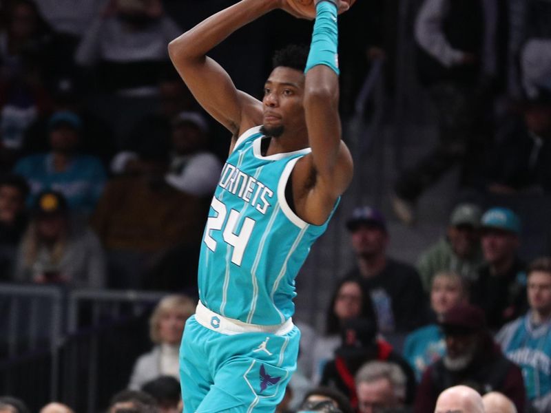 CHARLOTTE, NC -NOVEMBER 21:  Brandon Miller #24 of the Charlotte Hornets looks to pass the ball during the game against the Detroit Pistons on November 21, 2024 at Spectrum Center in Charlotte, North Carolina. NOTE TO USER: User expressly acknowledges and agrees that, by downloading and or using this photograph, User is consenting to the terms and conditions of the Getty Images License Agreement. Mandatory Copyright Notice: Copyright 2024 NBAE (Photo by Brock Williams-Smith/NBAE via Getty Images)