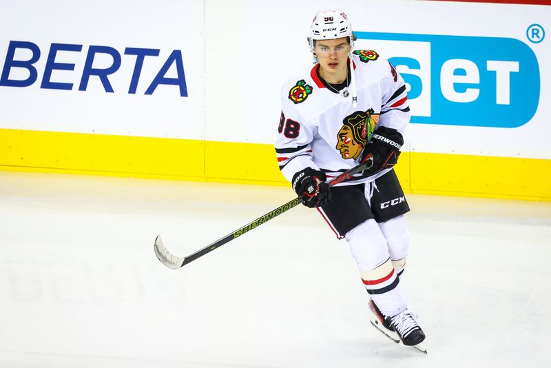 Oct 15, 2024; Calgary, Alberta, CAN; Chicago Blackhawks center Connor Bedard (98) skates during the warmup period against the Calgary Flames at Scotiabank Saddledome. Mandatory Credit: Sergei Belski-Imagn Images