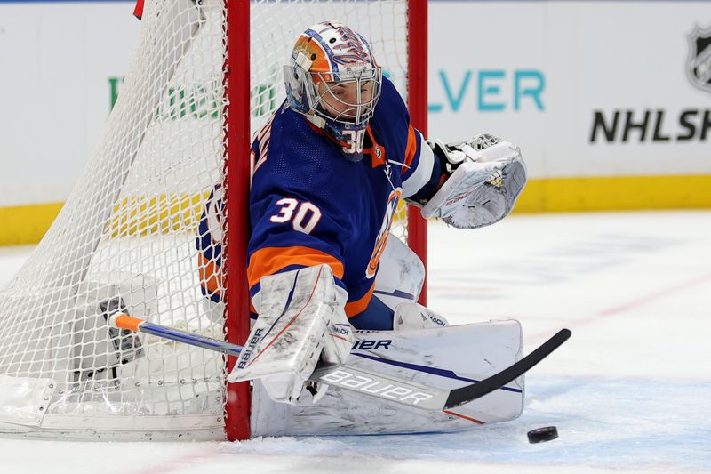 Mar 2, 2024; Elmont, New York, USA; New York Islanders goaltender Ilya Sorokin (30) makes a save against the Boston Bruins during the first quarter at UBS Arena. Mandatory Credit: Brad Penner-USA TODAY Sports