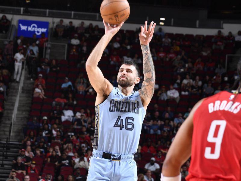 HOUSTON, TX - OCTOBER 25: John Konchar #46 of the Memphis Grizzlies shoots the ball during the game against the Houston Rockets on October 25, 2024 at the Toyota Center in Houston, Texas. NOTE TO USER: User expressly acknowledges and agrees that, by downloading and or using this photograph, User is consenting to the terms and conditions of the Getty Images License Agreement. Mandatory Copyright Notice: Copyright 2024 NBAE (Photo by Logan Riely/NBAE via Getty Images)