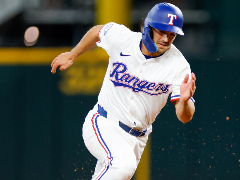 Jul 23, 2024; Arlington, Texas, USA; Texas Rangers third base Josh Smith (8) heads to third base during the first inning against the Chicago White Sox at Globe Life Field. Mandatory Credit: Andrew Dieb-USA TODAY Sports