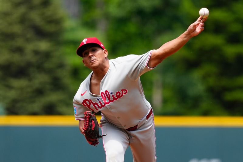 May 22, 2025; Denver, Colorado, USA; Philadelphia Phillies starting pitcher Ranger Suarez (55) delivers a pitch in the first inning against the Colorado Rockies at Coors Field. Mandatory Credit: Ron Chenoy-Imagn Images