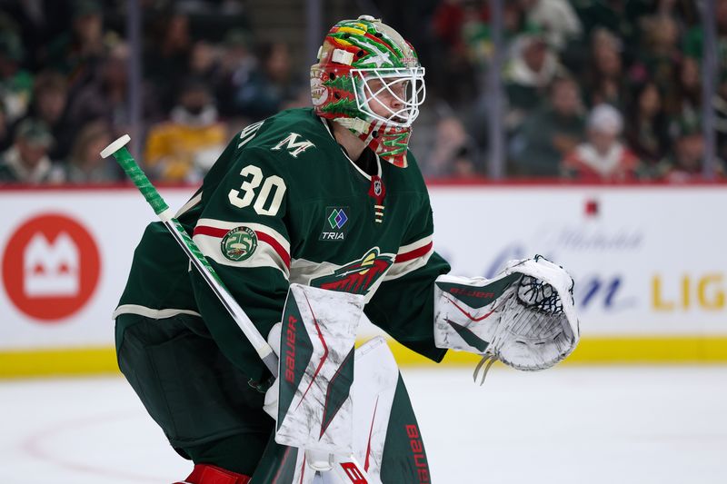 Mar 12, 2026; Saint Paul, Minnesota, USA; Minnesota Wild goaltender Jesper Wallstedt (30) defends his net against the Philadelphia Flyers during the first period at Grand Casino Arena. Mandatory Credit: Matt Krohn-Imagn Images