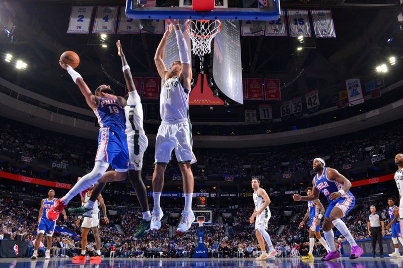 PHILADELPHIA, PA - OCTOBER 23: Caleb Martin #16 of the Philadelphia 76ers drives to the basket during the game against the Milwaukee Bucks on October 23, 2024 at the Wells Fargo Center in Philadelphia, Pennsylvania NOTE TO USER: User expressly acknowledges and agrees that, by downloading and/or using this Photograph, user is consenting to the terms and conditions of the Getty Images License Agreement. Mandatory Copyright Notice: Copyright 2024 NBAE (Photo by Jesse D. Garrabrant/NBAE via Getty Images)