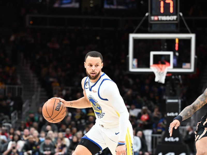 ATLANTA, GA - MARCH 17: Stephen Curry #30 of the Golden State Warriors dribbles the ball during the game against the Atlanta Hawks on March 17, 2023 at State Farm Arena in Atlanta, Georgia.  NOTE TO USER: User expressly acknowledges and agrees that, by downloading and/or using this Photograph, user is consenting to the terms and conditions of the Getty Images License Agreement. Mandatory Copyright Notice: Copyright 2023 NBAE (Photo by Adam Hagy/NBAE via Getty Images)