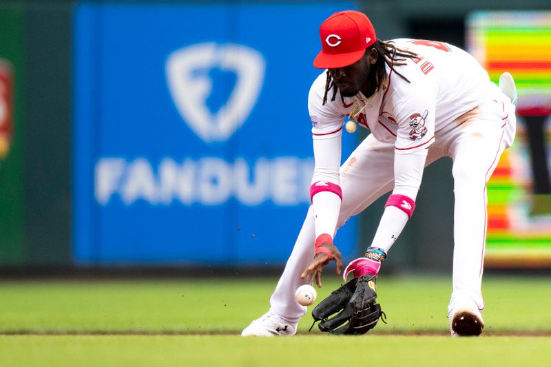 Aug 9, 2023; Cincinnati, OH, USA; Cincinnati Reds shortstop Elly De La Cruz (44) fields a ground ball hit by Miami Marlins shortstop Jon Berti (5) in the third inning of the MLB baseball game between Cincinnati Reds and Miami Marlins at Great American Ball Park in Cincinnati on Wednesday, Aug. 9, 2023.  Mandatory Credit: Albert Cesare-USA TODAY Sports