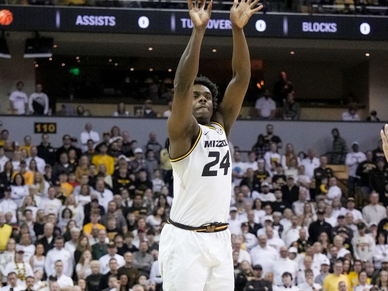 Mar 4, 2023; Columbia, Missouri, USA; Missouri Tigers guard Kobe Brown (24) scores a three point basket against the Mississippi Rebels during the first half at Mizzou Arena. Mandatory Credit: Denny Medley-USA TODAY Sports