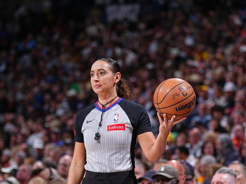 DENVER, CO - APRIL 10: Referee Ashley Moyer-Gleich #13 looks on during the game betweent the Minnesota Timberwolves and the Denver Nuggets on April 10, 2024 at the Ball Arena in Denver, Colorado. NOTE TO USER: User expressly acknowledges and agrees that, by downloading and/or using this Photograph, user is consenting to the terms and conditions of the Getty Images License Agreement. Mandatory Copyright Notice: Copyright 2024 NBAE (Photo by Garrett Ellwood/NBAE via Getty Images)